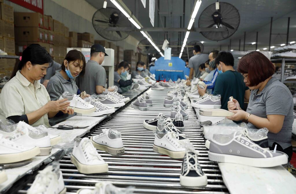 Le Vietnam joue un role important dans les chaines d approvisionnement d Adidas et de Nike